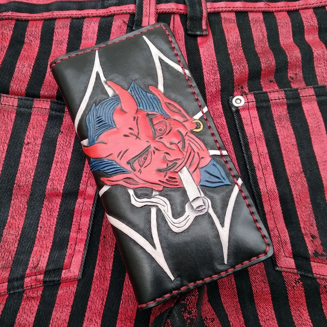 Biker-style wallet with engraved devil and flags by Another Way of Life