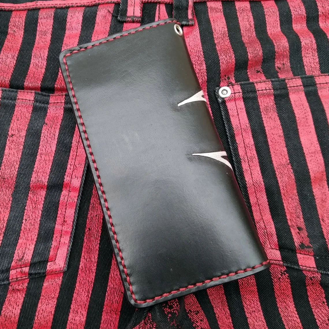 Biker-style wallet with engraved devil and flags by Another Way of Life